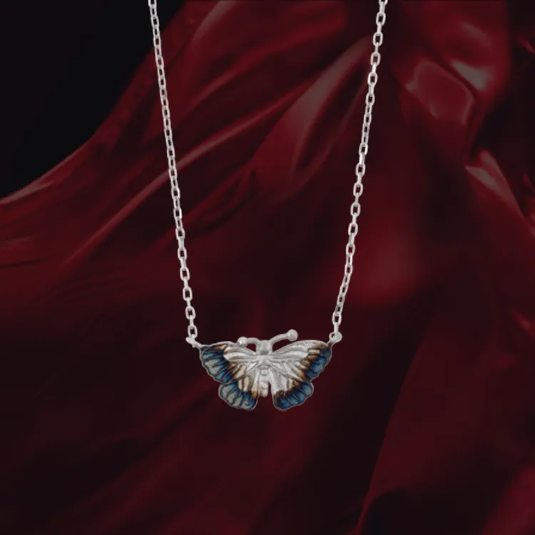 Delicate Butterfly Pendant with Ember Tones