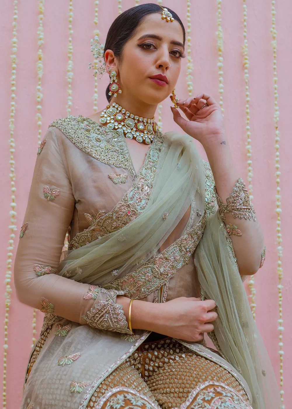 Net embroidered bridal outfit in rust orange color for wedding wear # B3414