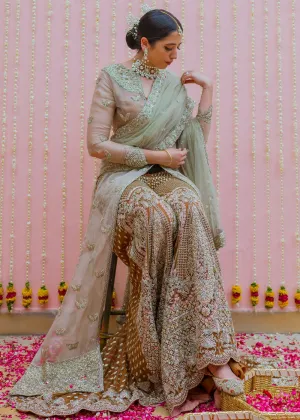 Net embroidered bridal outfit in rust orange color for wedding wear # B3414